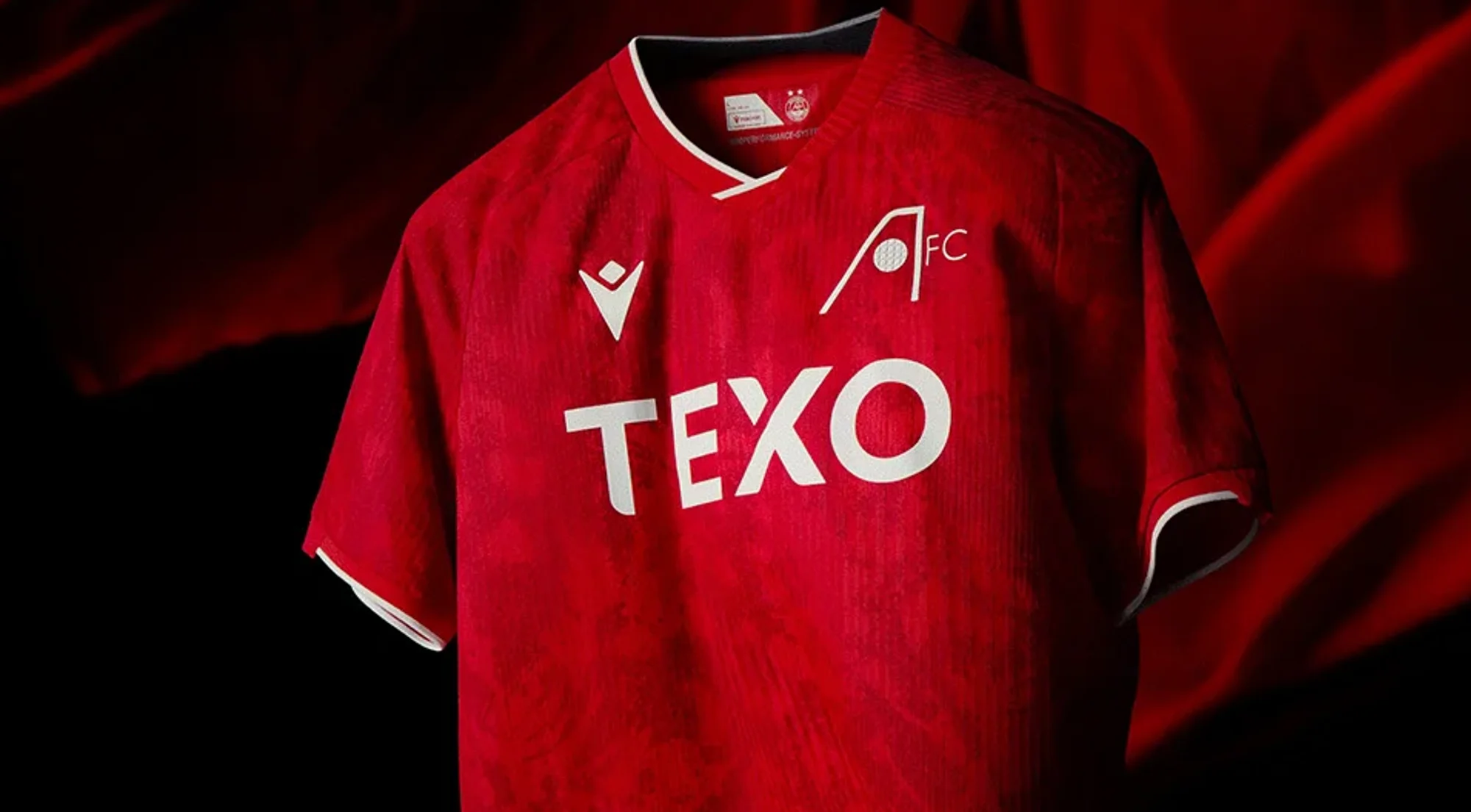 Leopardos y una biblioteca de cristal: así son las camisetas Macron del Aberdeen 2026-2027